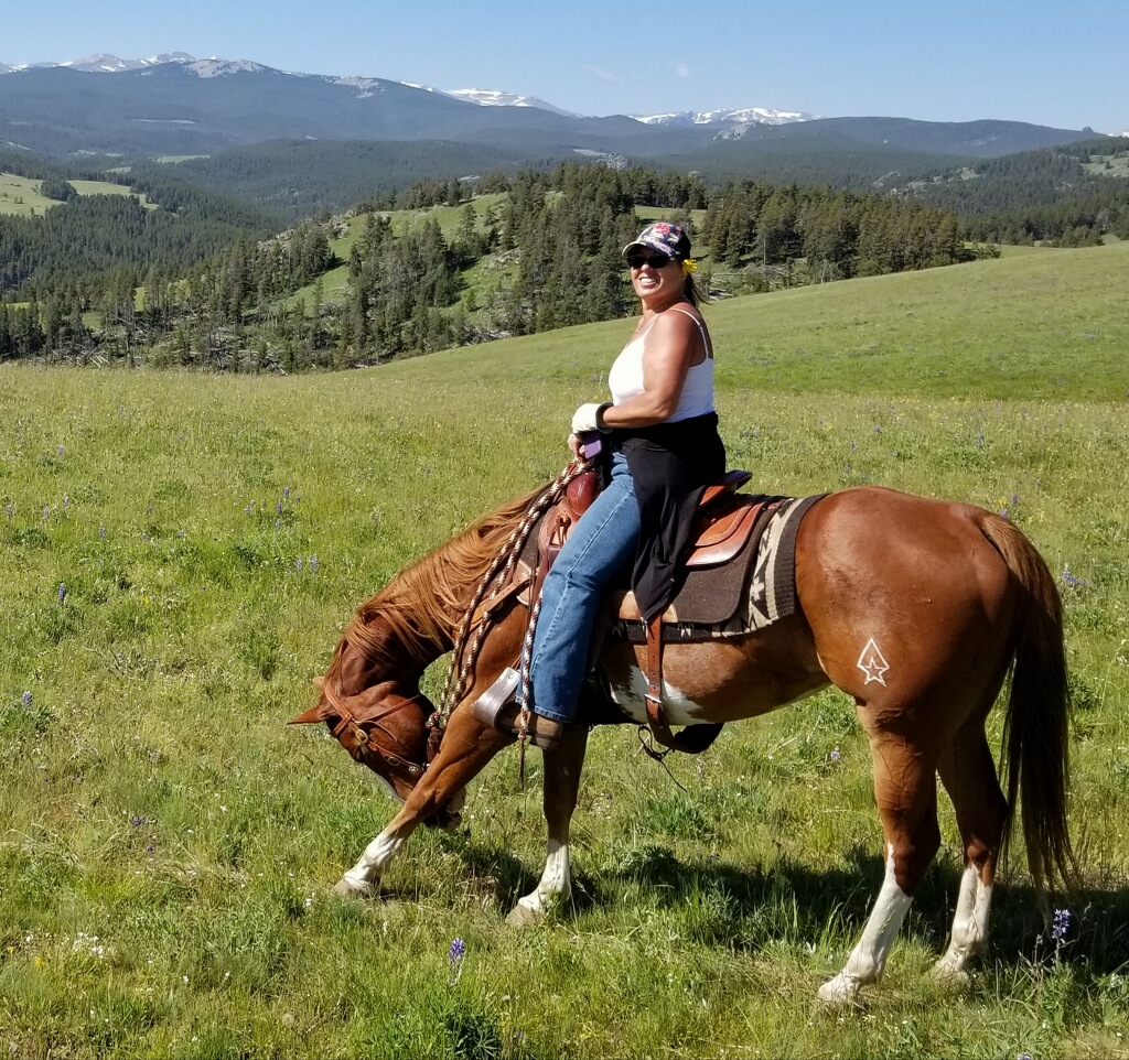 Kalli on Horse in Pasture at Cowboy Cattle Drive